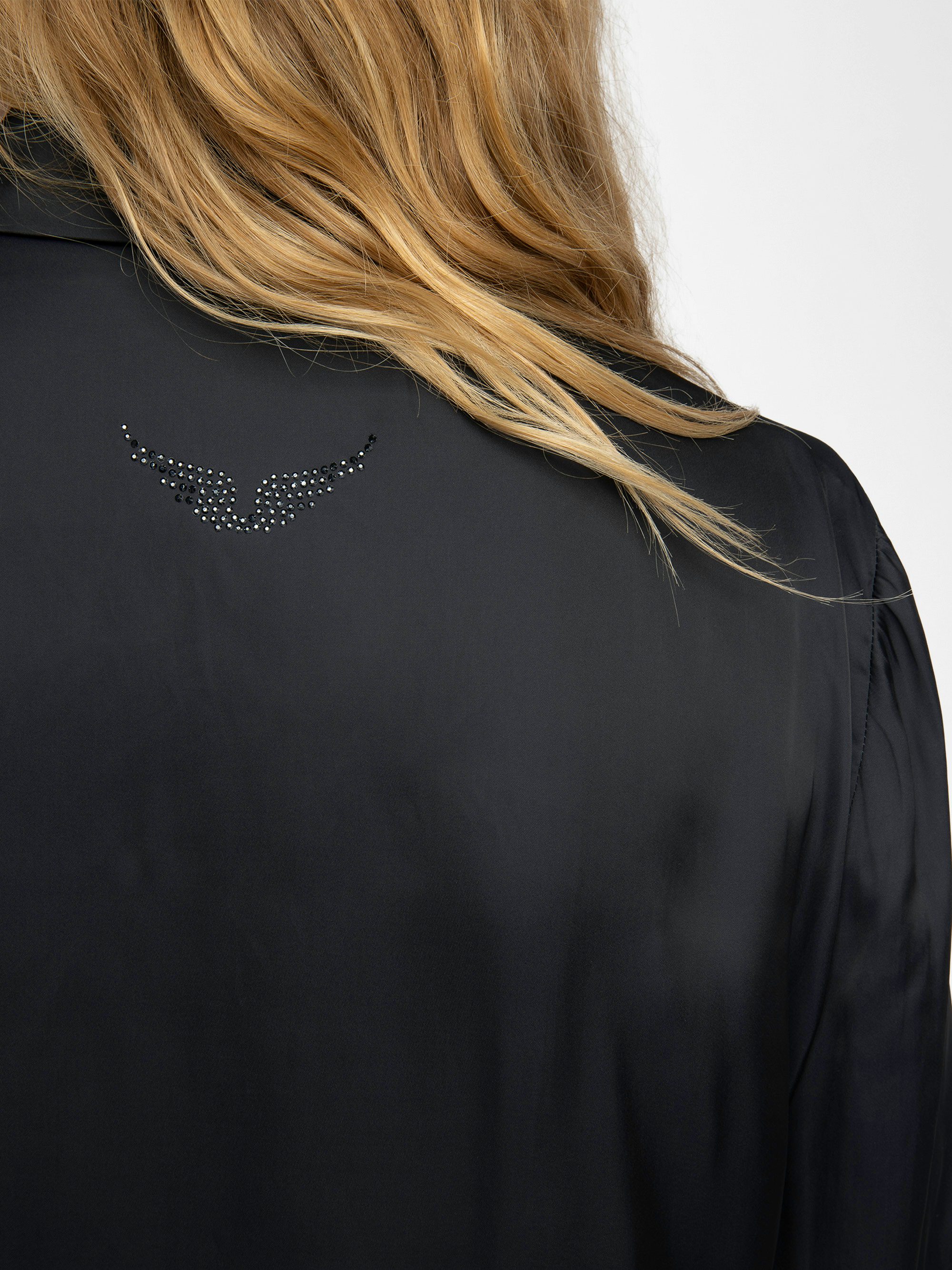 Thely Satin Shirt - Satin shirt with long sleeves, button fastening, and a wing-shaped rhinestone detail on the back.